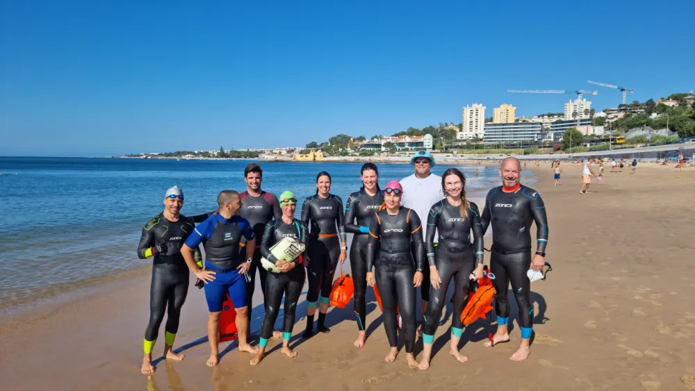 group of peopcle on the beach ready for swim
