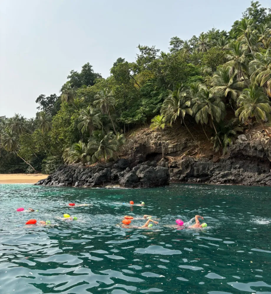 people group swimming on river