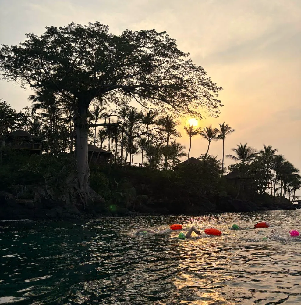 people swimming in the river
