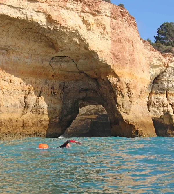 An incredible swimming experience under the sea caves and arches in Algar de Benagil