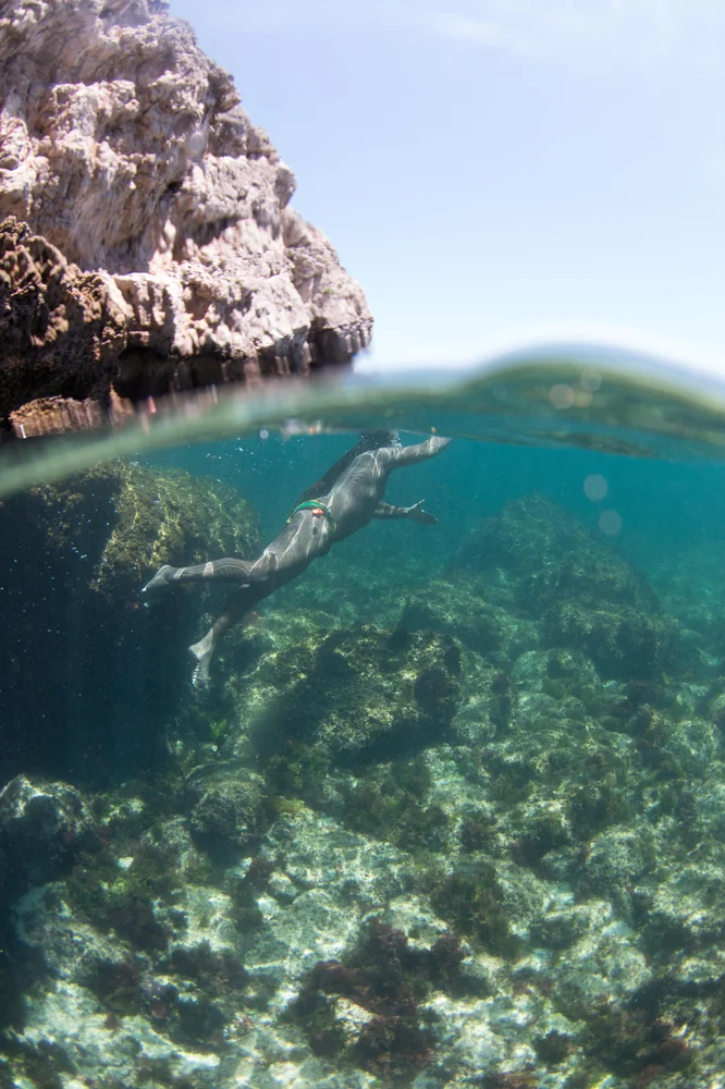 Swimmer-swimming-under-water-in-portugal