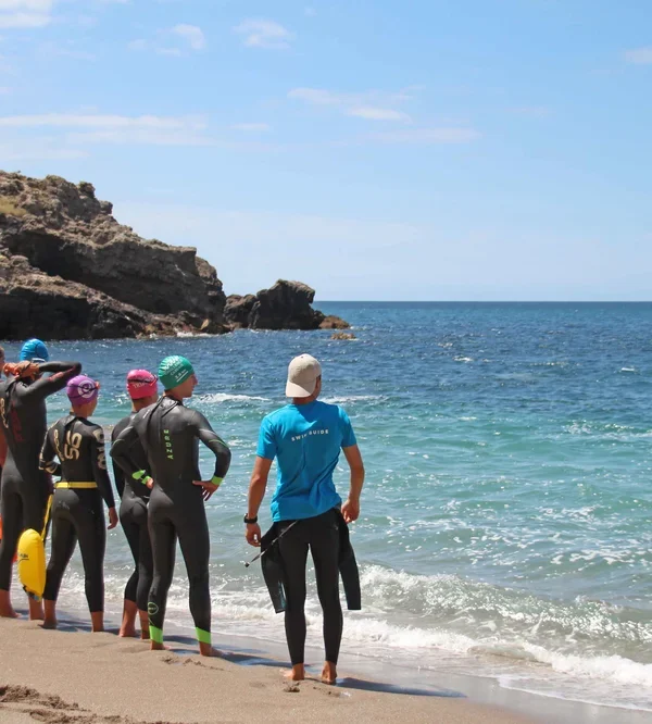 SwimTogether swim guide showing the way to five swimmers